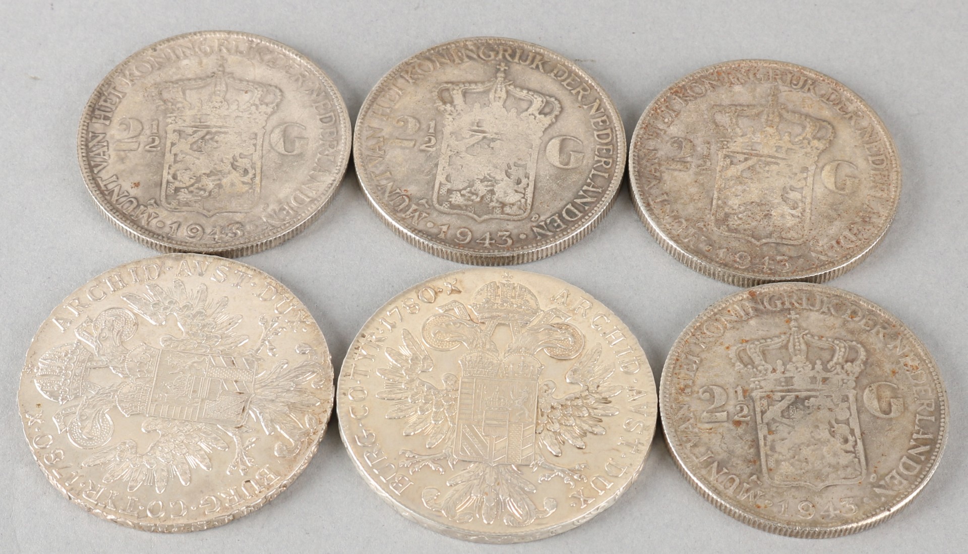 4 Zilveren rijksdaalders+ 2 zilveren Duitse munten.